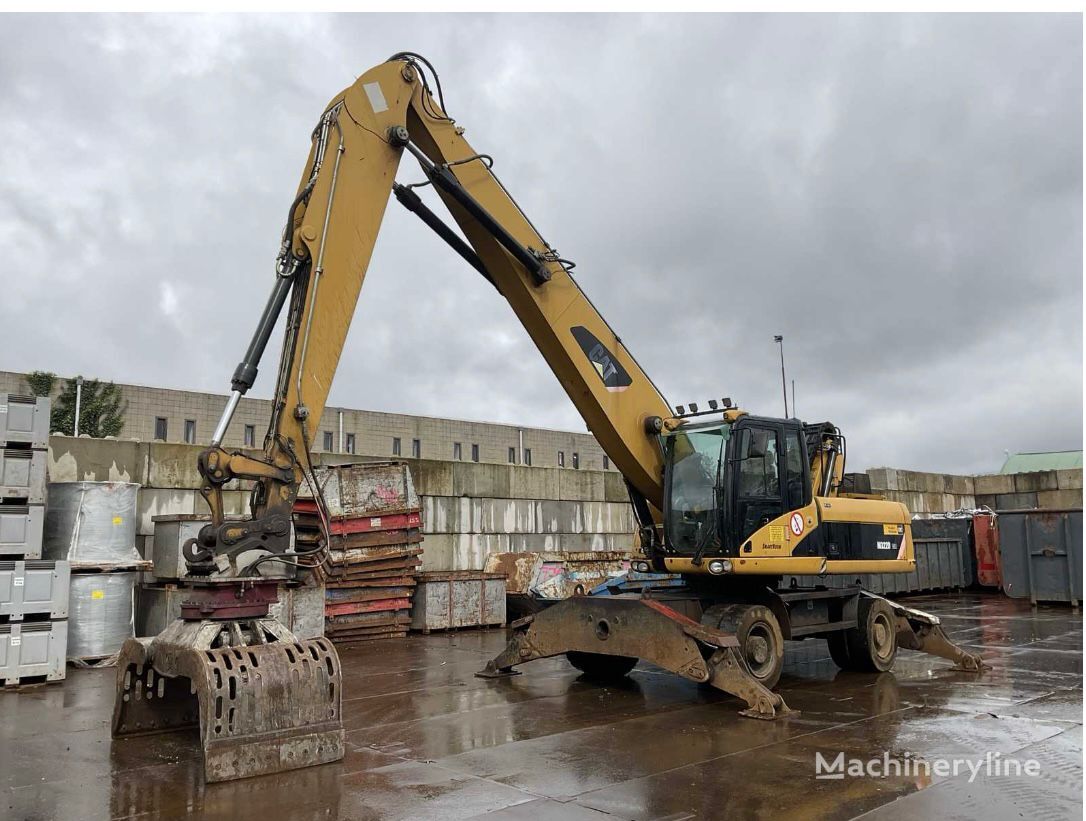 Caterpillar M 322 D MH Wheel Excavator For Sale France Prunay Le Gillon