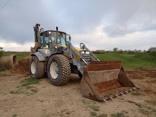 LÄNNEN 8600C backhoe loader