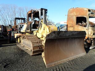 damaged Komatsu D61PXi-23 bulldozer