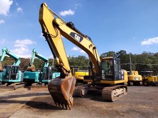 Caterpillar 320D rail excavator