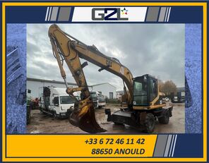 Caterpillar M312 wheel excavator for sale France ANOULD, BR37335