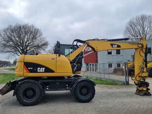 Caterpillar M313D wheel excavator