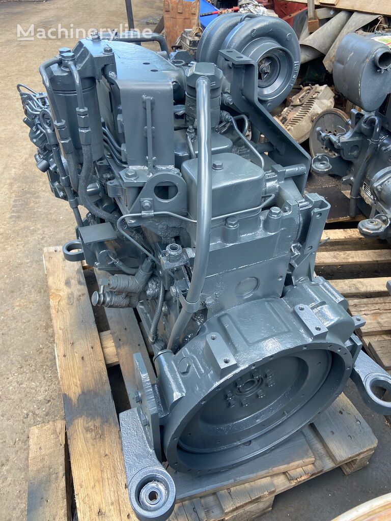 Komatsu SA6D102E engine for backhoe loader